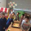 Making our pizza...ready to go into the oven!