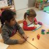 Lana and Emilia practicing their addition skills!